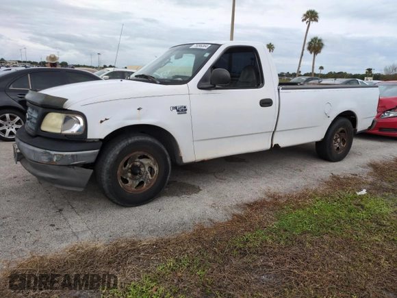 2003 Ford F-150 XL with VIN 1FTRF17W03NA02988, listed as a Copart auction lot 77209084 with Not Provided miles and Salvage Title. Bid and sale history available at DreamBid. Image 1.