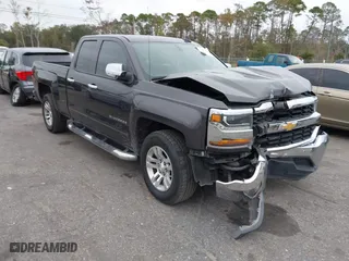2016 Chevrolet Silverado 1500 LT with VIN 1GCRCREC7GZ109079, listed as a IAAI auction lot 40985730 with 162,630 mi miles. Bid and sale history available at carsss.com. Image 1.