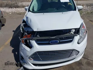 2016 Ford C-Max SEL z VIN 1FADP5CU8GL119275, wystawiony jako IAAI lot #41878985 z przebiegiem 39 580 mil mil oraz . Historia ofert i sprzedaży dostępna na DreamBid. Obrazek 6.