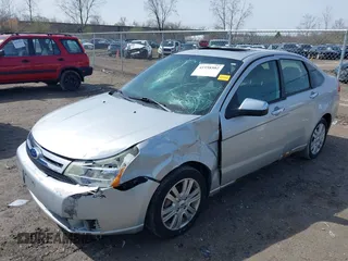 2011 Ford Focus SEL with VIN 1FAHP3HN1BW189263, listed as a IAAI auction lot 41958502 with 157,608 mi miles. Bid and sale history available at carsss.com. Image 6.