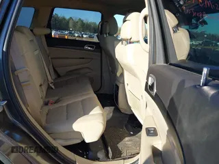 2020 Jeep Grand Cherokee Altitude with VIN 1C4RJEAG1LC102200, listed as a IAAI auction lot 41695582 with 74,843 mi miles and . Bid and sale history available at DreamBid. Image 8.