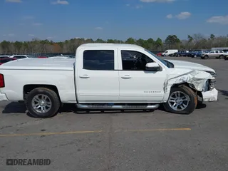 2015 Chevrolet Silverado 1500 LT with VIN 3GCUKREC9FG190338, listed as a IAAI auction lot 41793915 with 116,558 mi miles. Bid and sale history available at carsss.com. Image 13.