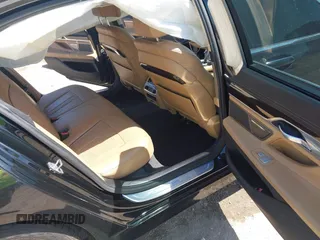 2017 BMW 7 Series 740i xDrive with VIN WBA7E4C50HGU99106, listed as a IAAI auction lot 41997603 with 138,322 mi miles. Bid and sale history available at carsss.com. Image 8.