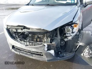2014 Mazda CX-5 Grand Touring with VIN JM3KE2DY8E0304911, listed as a IAAI auction lot 41672197 with 77,523 mi miles. Bid and sale history available at carsss.com. Image 6.