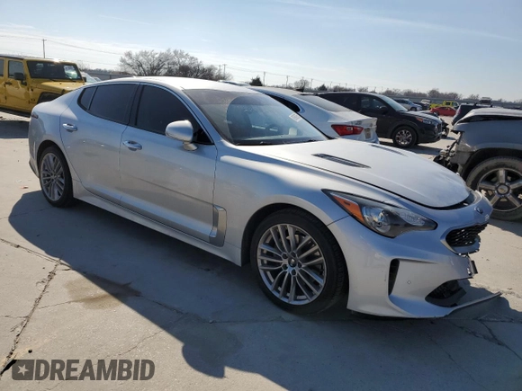 2018 Kia Stinger with VIN KNAE15LAXJ6012401, listed as a Copart auction lot 89369765 with 84,964 mi miles and Salvage Title. Bid and sale history available at DreamBid. Image 4.
