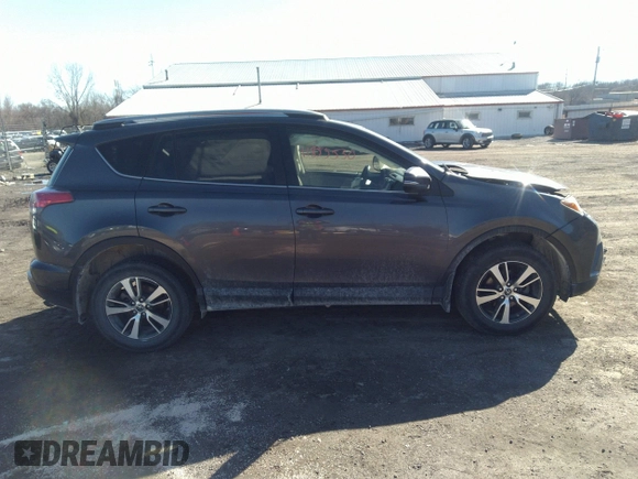 2018 Toyota RAV4 XLE with VIN JTMRFREV9JJ742276, listed as a IAAI auction lot 41855530 with 115,815 mi miles. Bid and sale history available at carsss.com. Image 13.