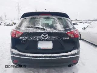 2016 Mazda CX-5 Sport z VIN JM3KE4BY0G0919017, wystawiony jako IAAI lot #41316161 z przebiegiem 209 259 mil mil oraz . Historia ofert i sprzedaży dostępna na DreamBid. Obrazek 16.