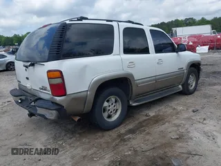 2002 Chevrolet Tahoe LS z VIN 1GNEC13Z12R145907, wystawiony jako IAAI lot #42144771 z przebiegiem 308 201 mil mil oraz . Historia ofert i sprzedaży dostępna na DreamBid. Obrazek 4.