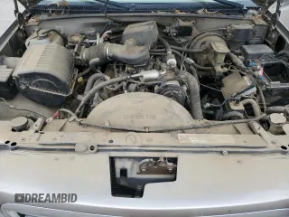 1999 Cadillac Escalade z VIN 1GYEK13R5XR415895, wystawiony jako Copart lot #87112044 z przebiegiem 141 662 mil mil oraz Tytuł czysty. Historia ofert i sprzedaży dostępna na DreamBid. Obrazek 12.