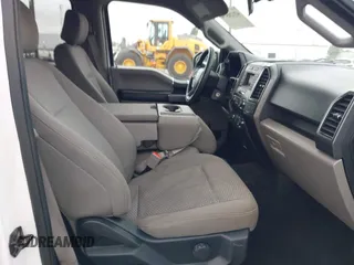 2018 Ford F-150 XL with VIN 1FTEW1CB4JKC87131, listed as a IAAI auction lot 42120579 with 93,143 mi miles. Bid and sale history available at carsss.com. Image 5.