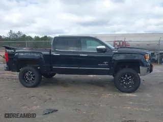 2015 GMC Sierra 1500 SLT with VIN 3GTU2VEJ1FG397717, listed as a IAAI auction lot 41721899 with 121,807 mi miles. Bid and sale history available at carsss.com. Image 14.