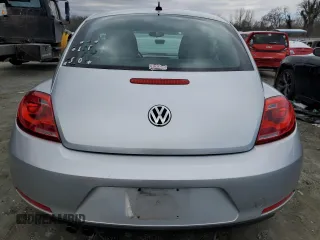 2012 Volkswagen Beetle 2.5L PZEV with VIN 3VWHP7AT5CM618672, listed as a Copart auction lot 46242285 with 148,428 mi miles and Salvage Title. Bid and sale history available at carsss.com. Image 6.