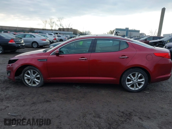 2013 Kia Optima EX z VIN 5XXGN4A78DG141924, wystawiony jako IAAI lot #41474952 z przebiegiem 172 814 mil mil oraz . Historia ofert i sprzedaży dostępna na DreamBid. Obrazek 13.