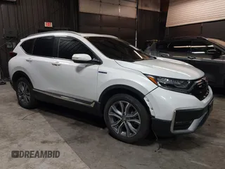 2021 Honda CR-V Touring with VIN 7FART6H98ME024238, listed as a IAAI auction lot 42341911 with 50,757 mi miles and . Bid and sale history available at DreamBid. Image 1.