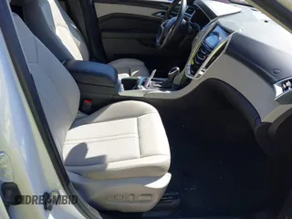 2014 Cadillac SRX Performance Collection with VIN 3GYFNFE30ES586713, listed as a IAAI auction lot 41791356 with 74,927 mi miles and . Bid and sale history available at DreamBid. Image 5.