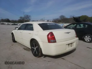 2005 Chrysler 300 with VIN 2C3JA43R25H663094, listed as a Copart auction lot 60813664 with 218,830 mi miles and Salvage Title. Bid and sale history available at carsss.com. Image 2.
