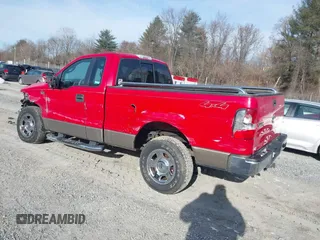 2005 Ford F-150 XL with VIN 1FTRF14W05NA77908, listed as a IAAI auction lot 41382643 with 128,135 mi miles. Bid and sale history available at carsss.com. Image 3.