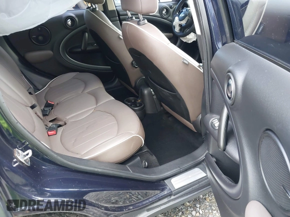 2015 MINI Countryman S z VIN WMWZC3C57FWT06297, wystawiony jako IAAI lot #41988157 z przebiegiem 74 461 mil mil oraz . Historia ofert i sprzedaży dostępna na DreamBid. Obrazek 8.