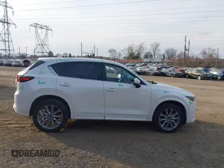 2024 Mazda CX-5 2.5 S Premium Package with VIN JM3KFBDL6R0427579, listed as a IAAI auction lot 41682849 with 5,325 mi miles. Bid and sale history available at carsss.com. Image 13.