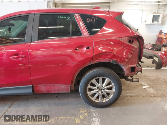 2016 Mazda CX-5 Sport z VIN JM3KE2BY3G0684861, wystawiony jako IAAI lot #42050897 z przebiegiem 165 688 mil mil oraz . Historia ofert i sprzedaży dostępna na DreamBid. Obrazek 6.