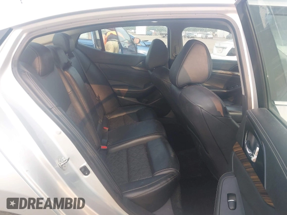 2018 Nissan Maxima SV z VIN 1N4AA6AP1JC366927, wystawiony jako IAAI lot #42394242 z przebiegiem 89 093 mil mil oraz . Historia ofert i sprzedaży dostępna na DreamBid. Obrazek 8.