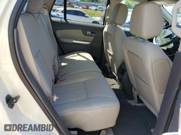 2013 Ford Edge SE z VIN 2FMDK3GCXDBB74803, wystawiony jako Copart lot #62902285 z przebiegiem 142 378 mil mil oraz Szkoda całkowita • Salvage title. Historia ofert i sprzedaży dostępna na DreamBid. Obrazek 11.