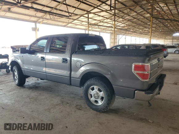 2013 Ford F-150 XL with VIN 1FTFW1ET2DKF21930, listed as a Copart auction lot 59563215 with 73,044 mi miles and Salvage title. Bid and sale history available at DreamBid. Image 2.