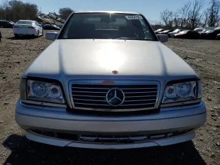 1996 Mercedes-Benz C with VIN WDBHM36E8TF345885, listed as a Copart auction lot 49954735 with Not Provided miles and Clean Title. Bid and sale history available at DreamBid. Image 5.