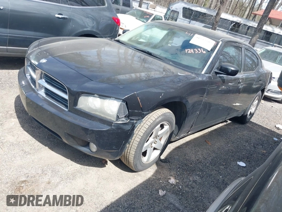 2010 Dodge Charger SXT with VIN 2B3CA3CV2AH124336, listed as a IAAI auction lot 41832204 with 255,562 mi miles and . Bid and sale history available at DreamBid. Image 2.