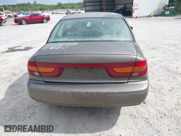 2000 Saturn SL z VIN 1G8ZK527XYZ121984, wystawiony jako IAAI lot #42099839 z przebiegiem 174 210 mil mil oraz . Historia ofert i sprzedaży dostępna na DreamBid. Obrazek 16.