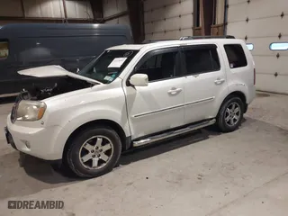 2011 Honda Pilot Touring with VIN 5FNYF4H93BB084167, listed as a IAAI auction lot 41374453 with 151,014 mi miles. Bid and sale history available at carsss.com. Image 17.
