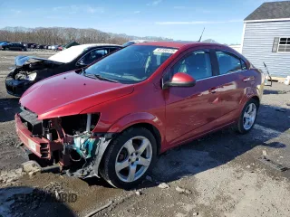 2012 Chevrolet Sonic LTZ z VIN 1G1JE5SHXC4126894, wystawiony jako Copart lot #45186475 z przebiegiem 76 461 mil mil oraz Czysty tytuł • Clean title. Historia ofert i sprzedaży dostępna na DreamBid. Obrazek 1.