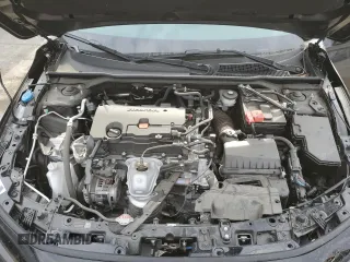 2024 Honda Civic LX z VIN 19XFL2H51RE022851, wystawiony jako Copart lot #54710105 z przebiegiem 16 873 mil mil oraz Szkoda całkowita • Salvage title. Historia ofert i sprzedaży dostępna na DreamBid. Obrazek 12.
