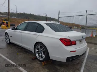 2013 BMW 7 Series 740i with VIN WBAYA6C57DC995338, listed as a IAAI auction lot 41479077 with 123,680 mi miles and . Bid and sale history available at DreamBid. Image 3.