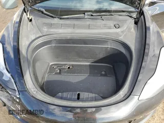 2019 Tesla Model 3 Mid Range z VIN 5YJ3E1EA7KF420025, wystawiony jako Copart lot #56149015 z przebiegiem 253 771 mil mil oraz Szkoda całkowita • Salvage title. Historia ofert i sprzedaży dostępna na DreamBid. Obrazek 11.