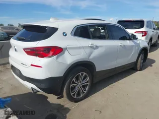 2020 BMW X2 sDrive28i with VIN WBXYH9C01L5P15004, listed as a IAAI auction lot 41128060 with 86,052 mi miles. Bid and sale history available at carsss.com. Image 4.