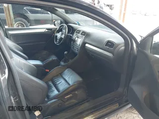 2012 Volkswagen Golf w/Sunroof & Navi z VIN WVWRF7AJ1CW285279, wystawiony jako IAAI lot #41884105 z przebiegiem 145 851 mil mil oraz . Historia ofert i sprzedaży dostępna na DreamBid. Obrazek 5.