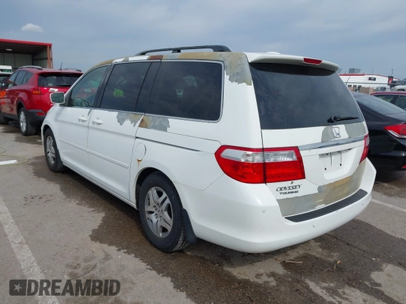 2007 Honda Odyssey Touring with VIN 5FNRL38887B081562, listed as a IAAI auction lot 42000435 with 238,287 mi miles and . Bid and sale history available at DreamBid. Image 3.