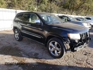 2011 Jeep Grand Cherokee Overland with VIN 1J4RS6GG7BC646610, listed as a Copart auction lot 79931614 with 188,601 mi miles and Salvage Title. Bid and sale history available at DreamBid. Image 4.