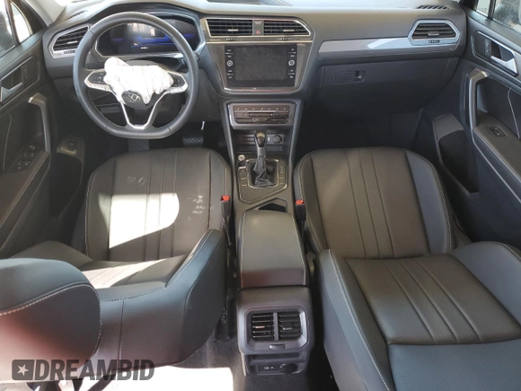 2023 Volkswagen Tiguan SE с VIN 3VV3B7AXXPM088057, выставлен на аукционе Copart как лот 49840355 с пробегом 21 405 миль миль и Списание • Salvage title. История ставок и продаж доступна на DreamBid. Изображение 8.