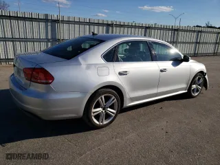 2013 Volkswagen Passat SE with VIN 1VWBP7A37DC106002, listed as a Copart auction lot 83014264 with 215,406 mi miles and Salvage Title. Bid and sale history available at carsss.com. Image 3.