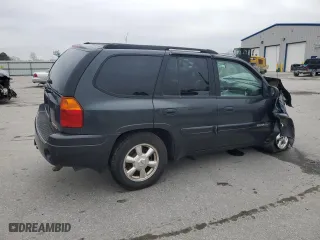 2004 GMC Envoy SLE with VIN 1GKDS13S942432115, listed as a Copart auction lot 43817125 with 147,228 mi miles and Salvage Title. Bid and sale history available at carsss.com. Image 3.