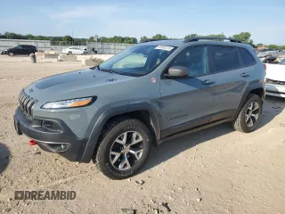 2014 Jeep Cherokee Trailhawk z VIN 1C4PJMBS4EW211711, wystawiony jako Copart lot #61001215 z przebiegiem 161 531 mil mil oraz Czysty tytuł • Clean title. Historia ofert i sprzedaży dostępna na DreamBid. Obrazek 1.
