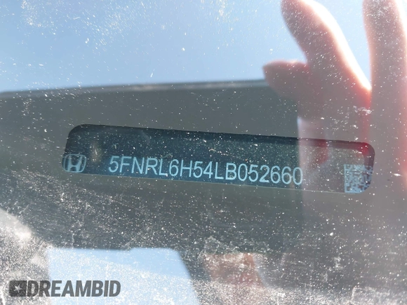 2020 Honda Odyssey EX with VIN 5FNRL6H54LB052660, listed as a IAAI auction lot 42051157 with 51,159 mi miles and . Bid and sale history available at DreamBid. Image 9.