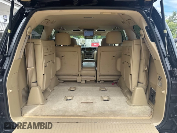 2011 Lexus LX 570 with VIN JTJHY7AX5B4082980, listed as a IAAI auction lot 42360972 with 236,563 mi miles and . Bid and sale history available at DreamBid. Image 6.