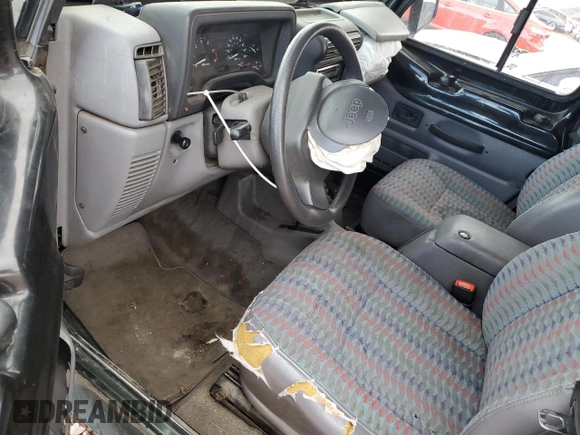 1997 Jeep Wrangler Sport with VIN 1J4FY19S6VP541852, listed as a Copart auction lot 48047235 with 163,501 mi miles and Salvage Title. Bid and sale history available at carsss.com. Image 8.
