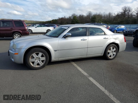 2006 Chrysler 300 C with VIN 2C3KK63H46H296625, listed as a Copart auction lot 70220974 with 104,811 mi miles and Salvage Title. Bid and sale history available at carsss.com. Image 1.