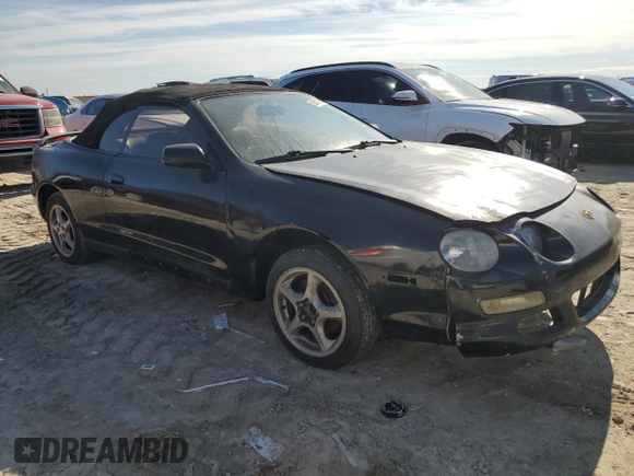 1998 Toyota Celica GT z VIN JT5FG02T2W0049461, wystawiony jako Copart lot #88813795 z przebiegiem 191 123 mil mil oraz Czysty tytuł • Clean title. Historia ofert i sprzedaży dostępna na DreamBid. Obrazek 4.