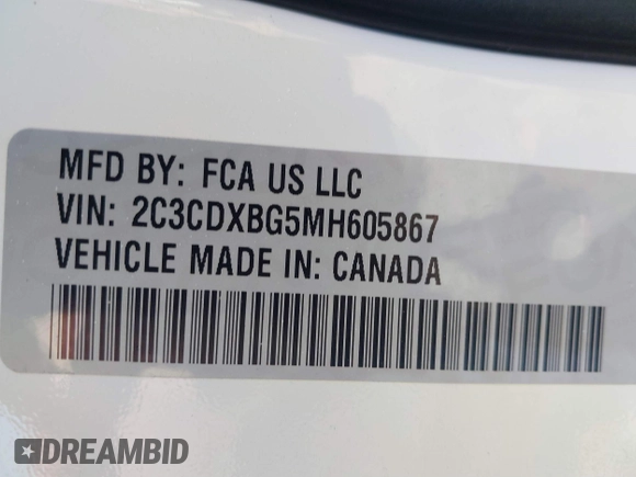 2021 Dodge Charger SXT with VIN 2C3CDXBG5MH605867, listed as a IAAI auction lot 41682336 with 56,660 mi miles and . Bid and sale history available at DreamBid. Image 9.