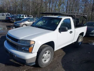 2012 Chevrolet Colorado Work Truck with VIN 1GCCSBF99C8158304, listed as a IAAI auction lot 41986210 with 165,264 mi miles. Bid and sale history available at carsss.com. Image 2.